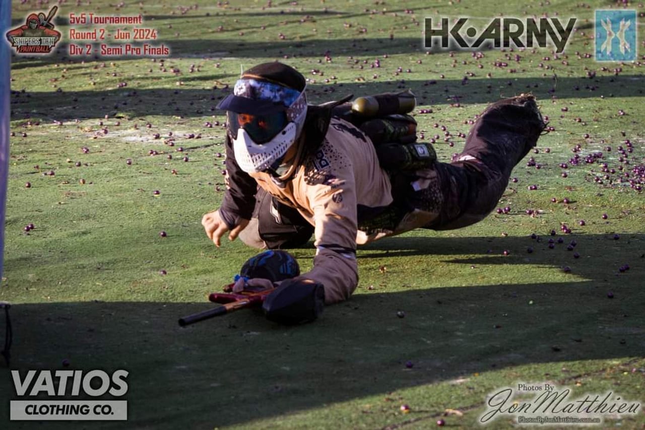 A Lumberjacks player diving on the field